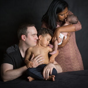 family of four in a photography studio